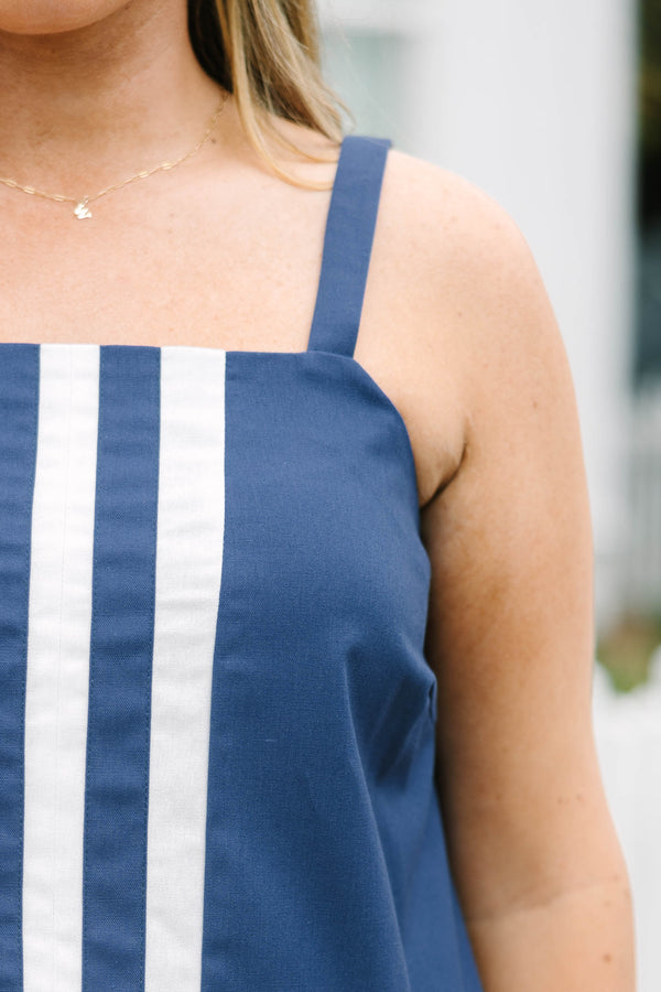 Chic Soul plus size clothing, navy blue sleeveless top with three white vertical stripes that go down the middle of the top and connect to three horizontal white stripes at the bottom of the top