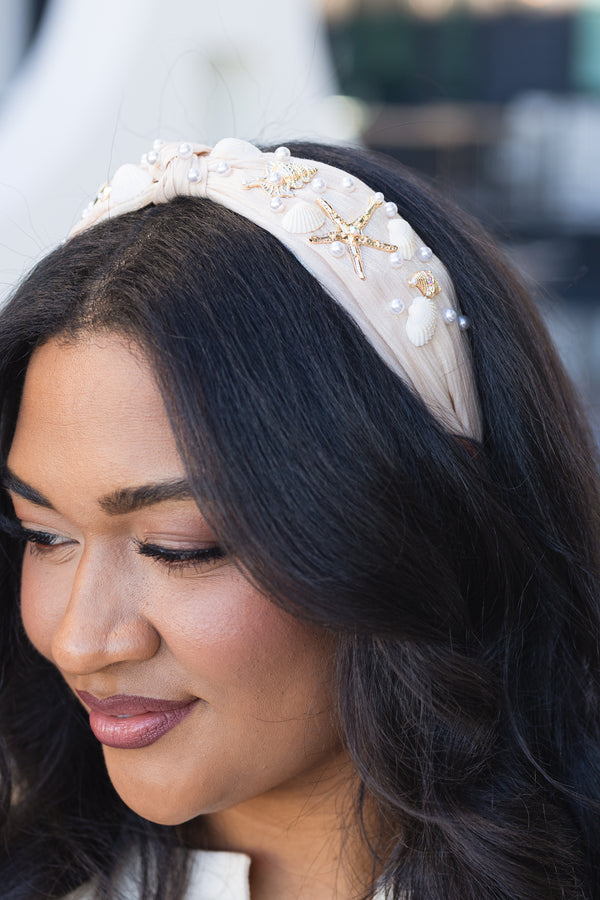 Chic Soul plus size clothing, cream and tan burlap style headband with knot in the middle and gold starfish, beige shells, and pearls sown into the headband