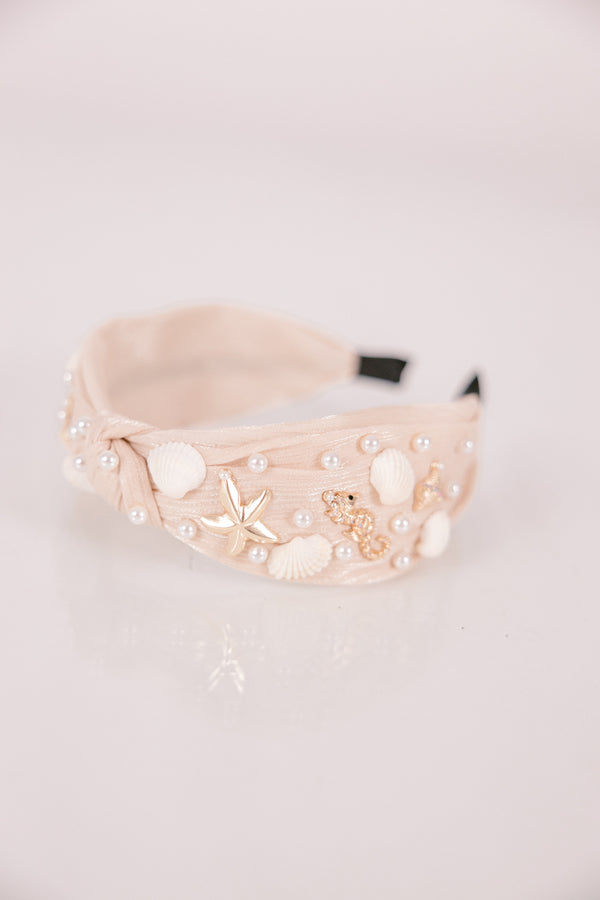 Chic Soul plus size clothing, cream and tan burlap style headband with knot in the middle and gold starfish, beige shells, and pearls sown into the headband