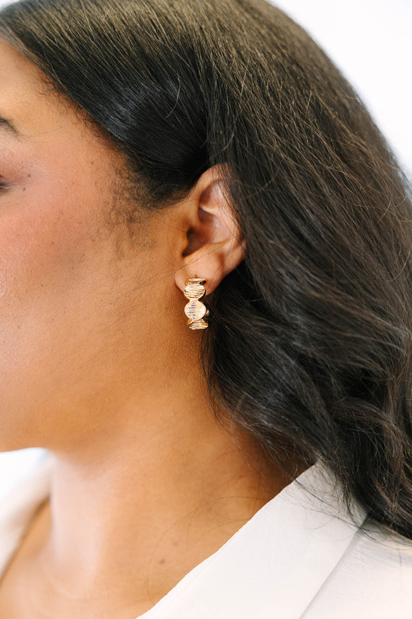 Plus Size gold open hoop earrings featuring a textured, overlapping shell casting design.