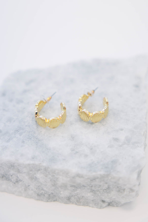 Plus Size gold open hoop earrings featuring a textured, overlapping shell casting design.