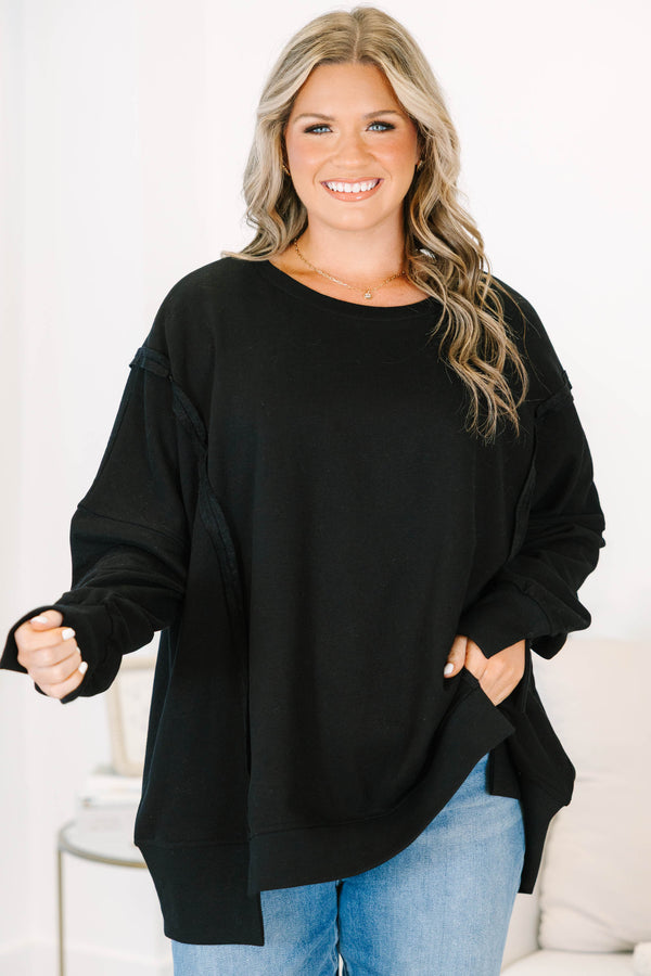 Plus size Sunset Glow Pullover in black, featuring a relaxed fit, crew neck, and raw seam details.