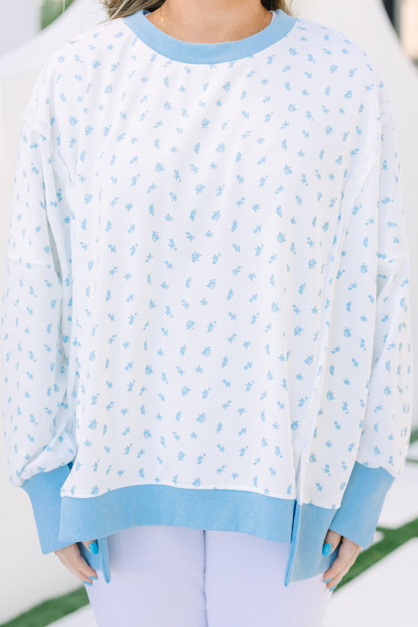 Chic Soul plus size clothing, blue floral pullover with side slits and exposed seams