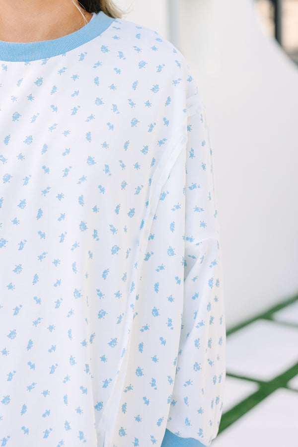 Chic Soul plus size clothing, blue floral pullover with side slits and exposed seams