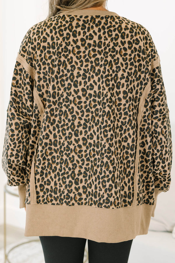 Plus Size brown leopard print pullover with a crew neckline, long sleeves, and ribbed trim.