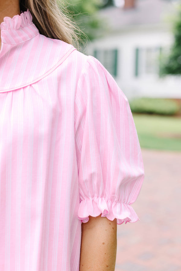 Plus Size pink and white striped top with a ruffled collar, buttoned placket, and puff sleeves.
