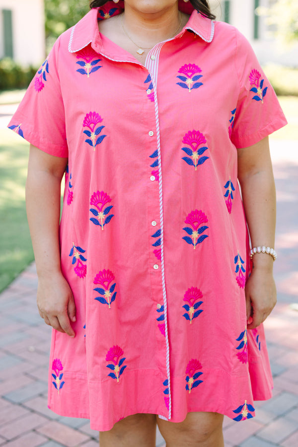 Plus Size pink button-down shirt dress with blue and magenta floral embroidery and short sleeves.