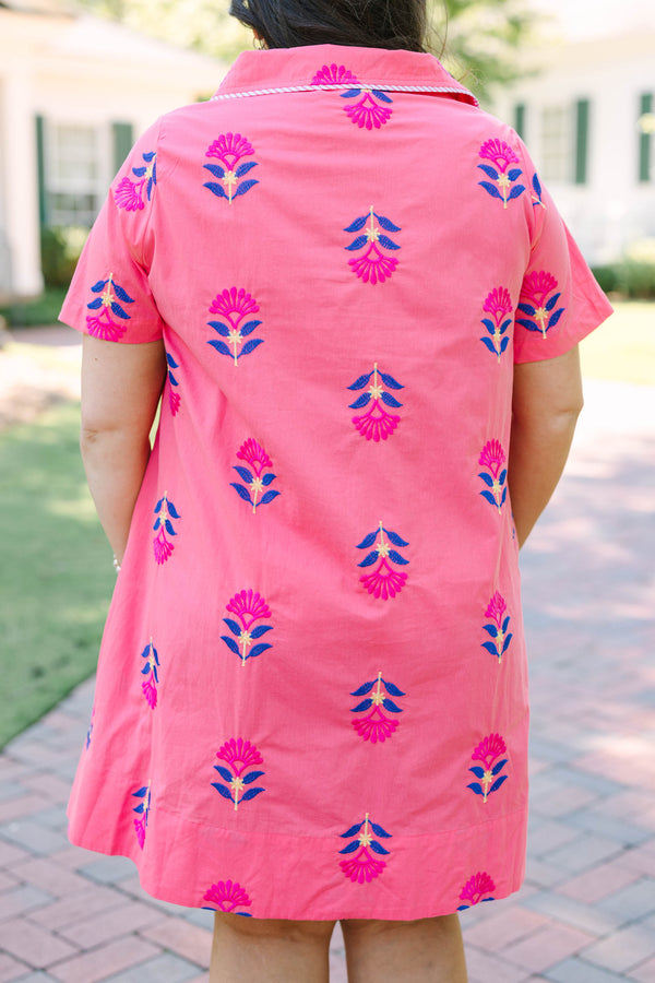 Plus Size pink button-down shirt dress with blue and magenta floral embroidery and short sleeves.