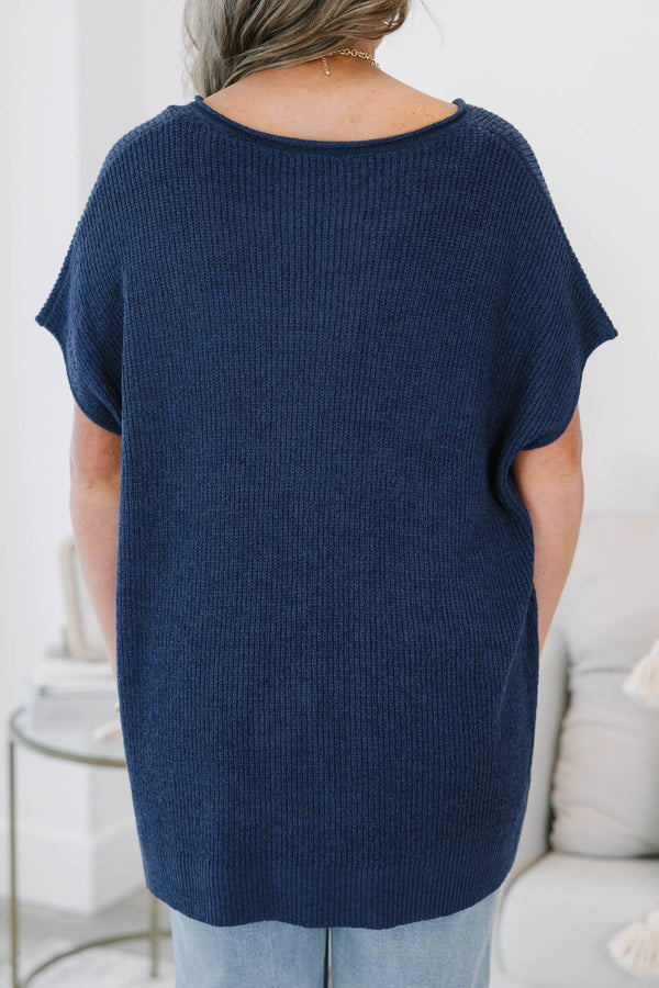 Plus size navy blue knit Sweet Escape Sweater with a flowy fit, V-neckline, and short sleeves.