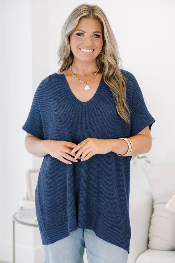 Plus size navy blue knit Sweet Escape Sweater with a flowy fit, V-neckline, and short sleeves.