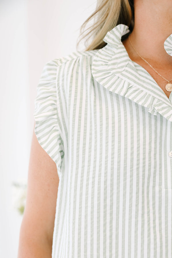Plus Size green and white striped top with flutter sleeves, a ruffled collar, and button details.