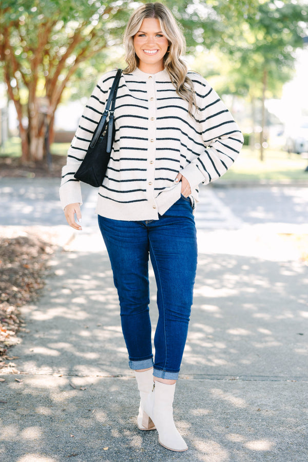 Plus Size oatmeal cardigan with black horizontal stripes, gold buttons, and a crew neckline.