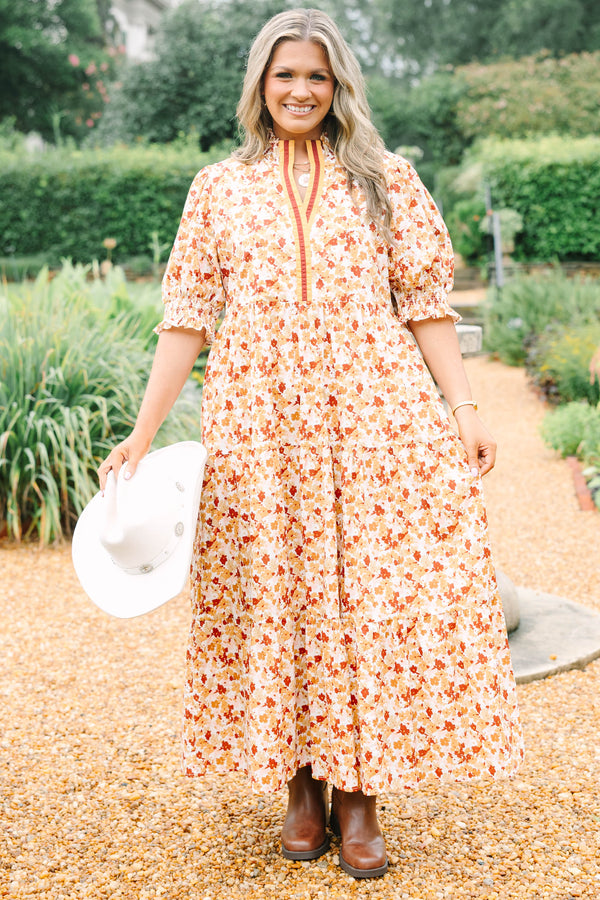 Plus Size brown floral maxi dress with a smocked collar, puff sleeves, and tiered body.