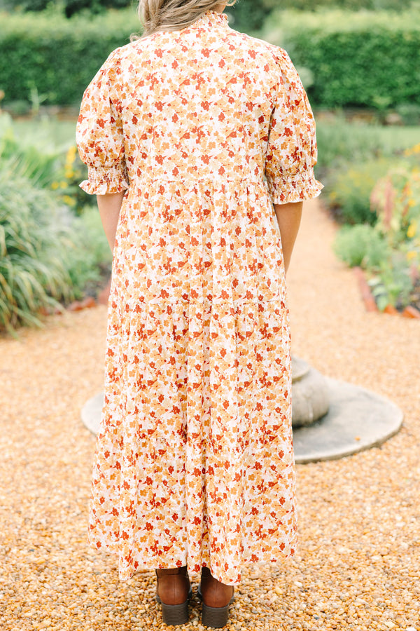 Plus Size brown floral maxi dress with a smocked collar, puff sleeves, and tiered body.