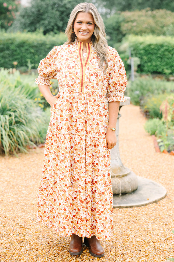 Plus Size brown floral maxi dress with a smocked collar, puff sleeves, and tiered body.