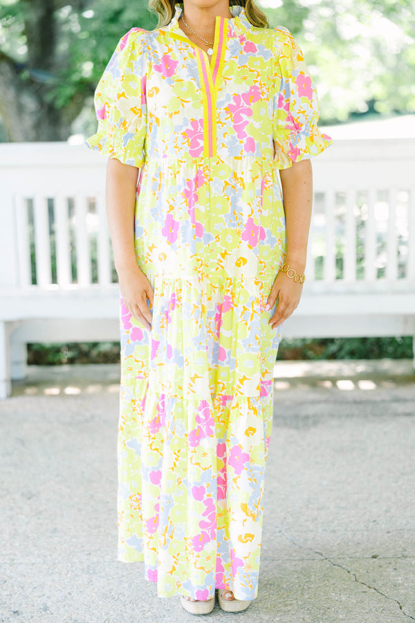 Plus Size yellow floral maxi dress with short puff sleeves, a tiered skirt, and a smocked collar.