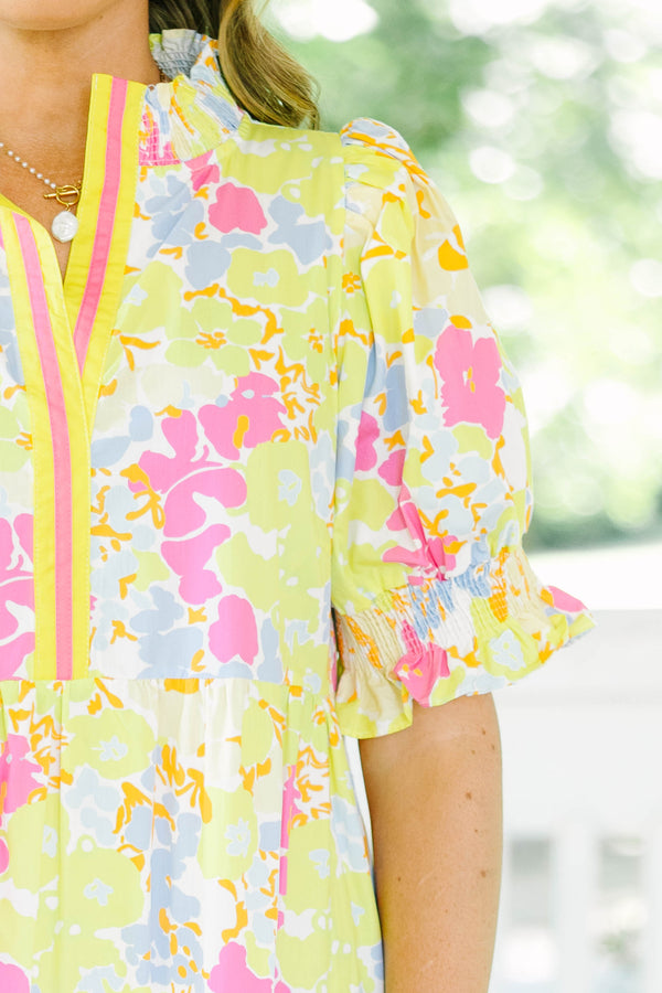 Plus Size yellow floral maxi dress with short puff sleeves, a tiered skirt, and a smocked collar.