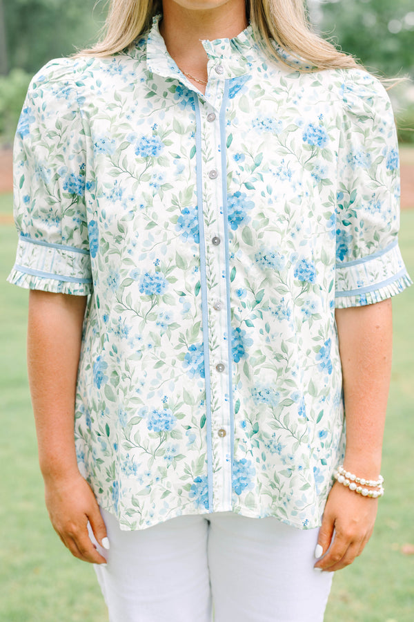 Plus Size green and blue floral button-down top with puff sleeves, ruffles, and a high collar.
