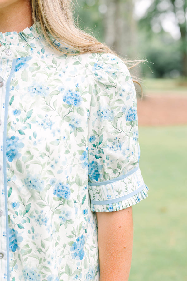 Plus Size green and blue floral button-down top with puff sleeves, ruffles, and a high collar.