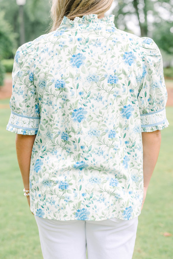 Plus Size green and blue floral button-down top with puff sleeves, ruffles, and a high collar.