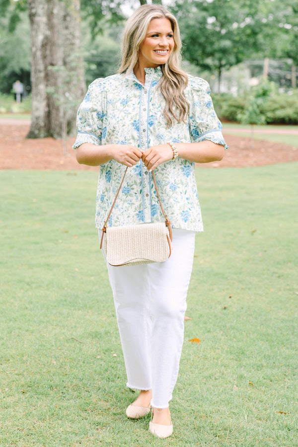 Plus Size green and blue floral button-down top with puff sleeves, ruffles, and a high collar.