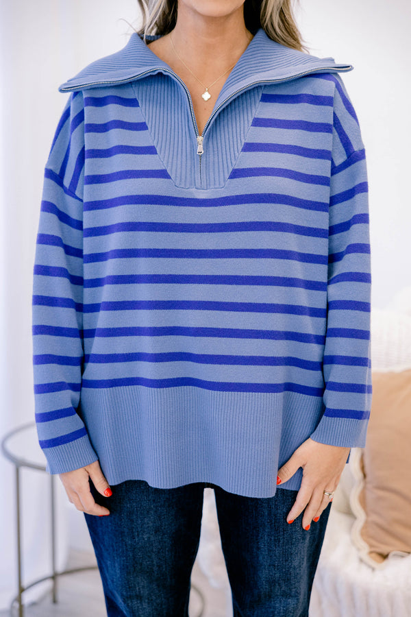 Chic Soul plus size clothing, blue sweater with a darker blue striped pattern as well as a zipper that goes down to the chest 