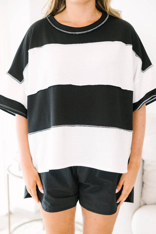 Plus size black and white striped tee with a flowy fit