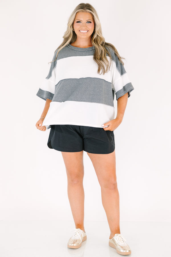 Plus Size charcoal and white wide-striped oversized tee with raw-edge seams and short sleeves.