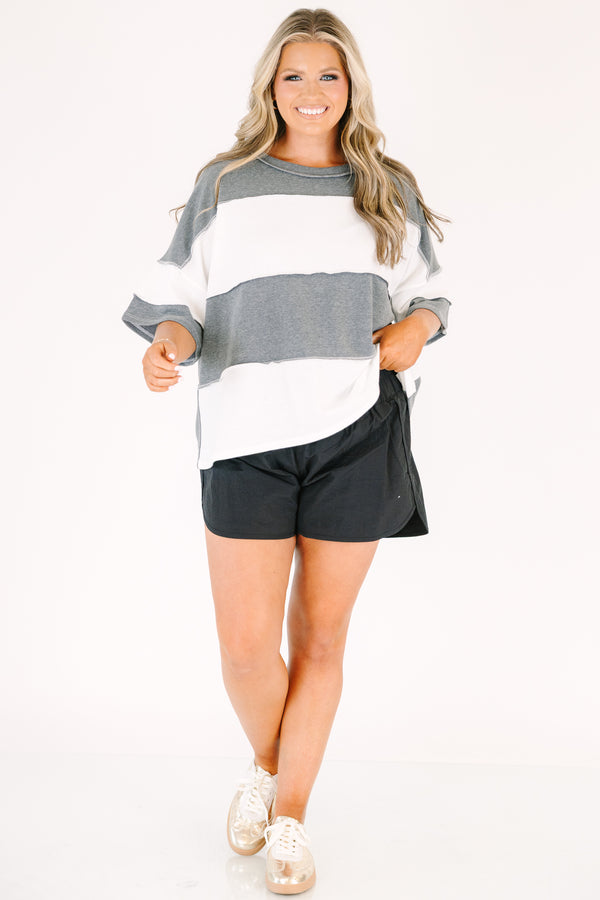Plus Size charcoal and white wide-striped oversized tee with raw-edge seams and short sleeves.