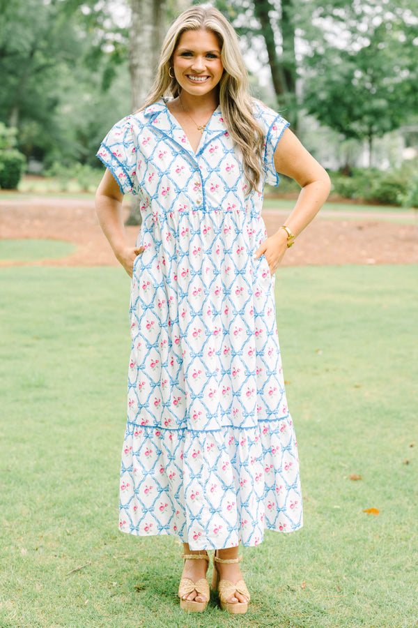 Plus Size white maxi dress with blue bow lattice and pink floral print, featuring a collared neck.