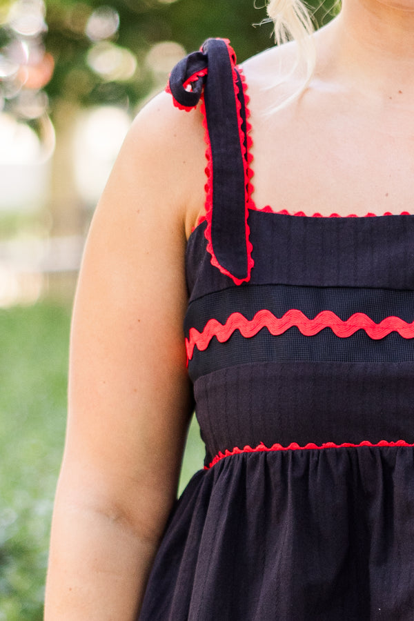 Chic Soul plus size clothing, black thin strap tank top with tie strap detail with square neckline with synched waist and red scalloped detail along top and straps