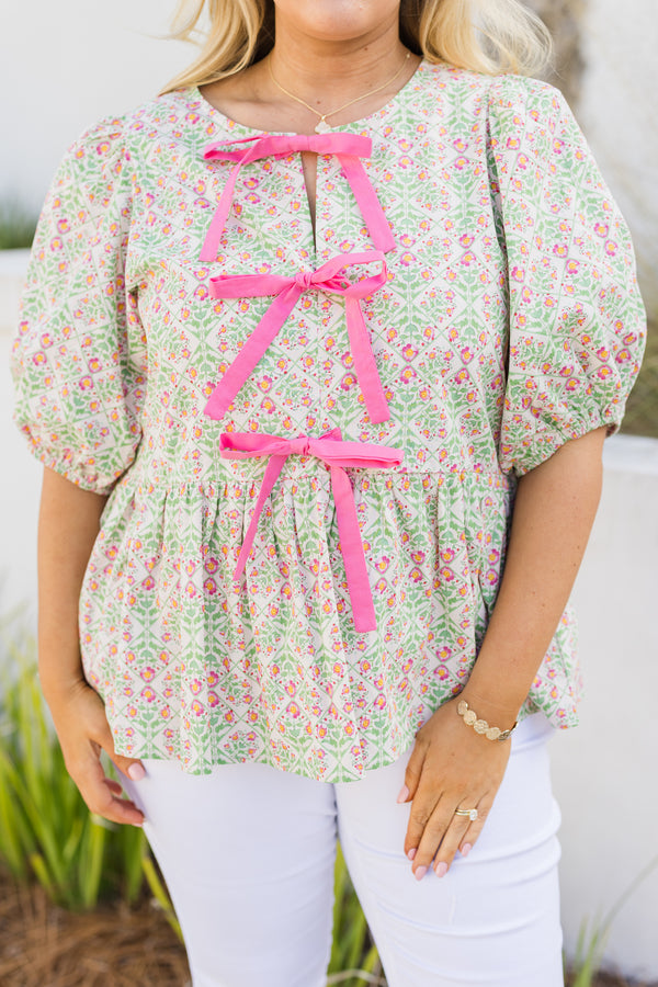 Chic Soul plus size clothing, white pink and green ditsy floral print short puff sleeve baby doll top with three pink bows down the middle