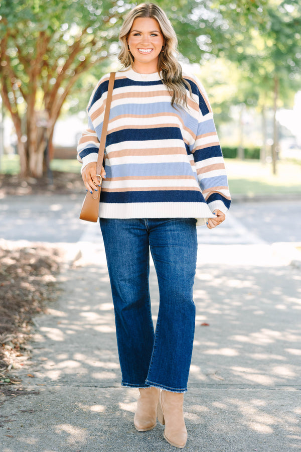 Plus Size oversized crewneck sweater with horizontal stripes in navy, light blue, tan, and white.