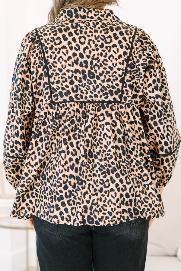 Plus Size leopard print babydoll top with long puff sleeves, a V-neckline, and black trim details.