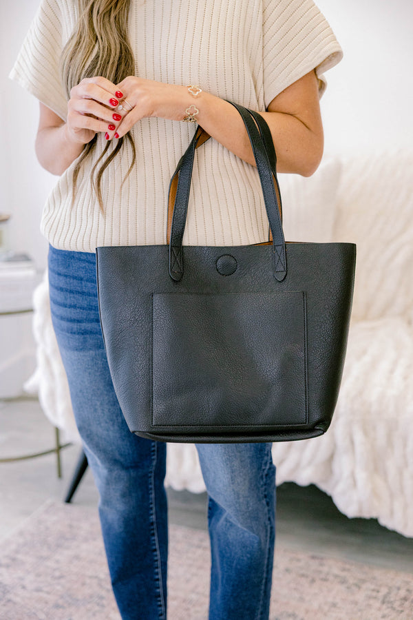 Chic Soul pus size clothing, black leather tote bag with medium length handles and a large front pocket
