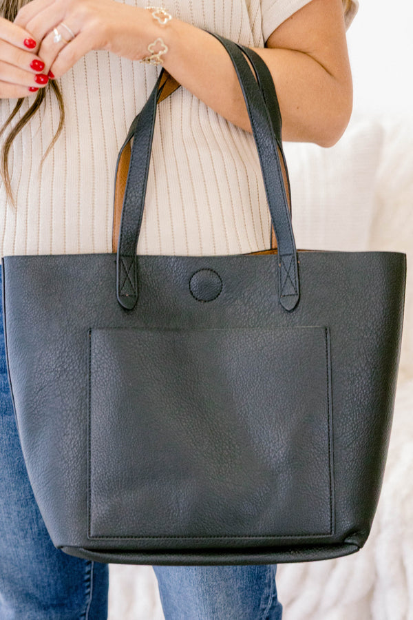 Chic Soul pus size clothing, black leather tote bag with medium length handles and a large front pocket