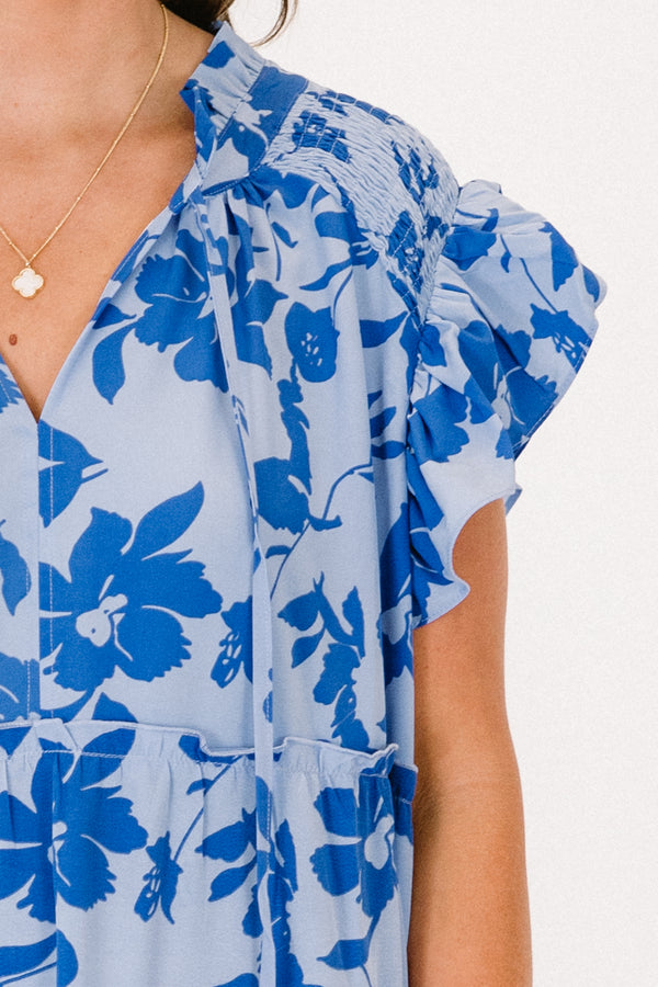 Chic Soul plus size clothing, short sleeve ruffled blue dress with v-neckline and tassels with darker blue floral details