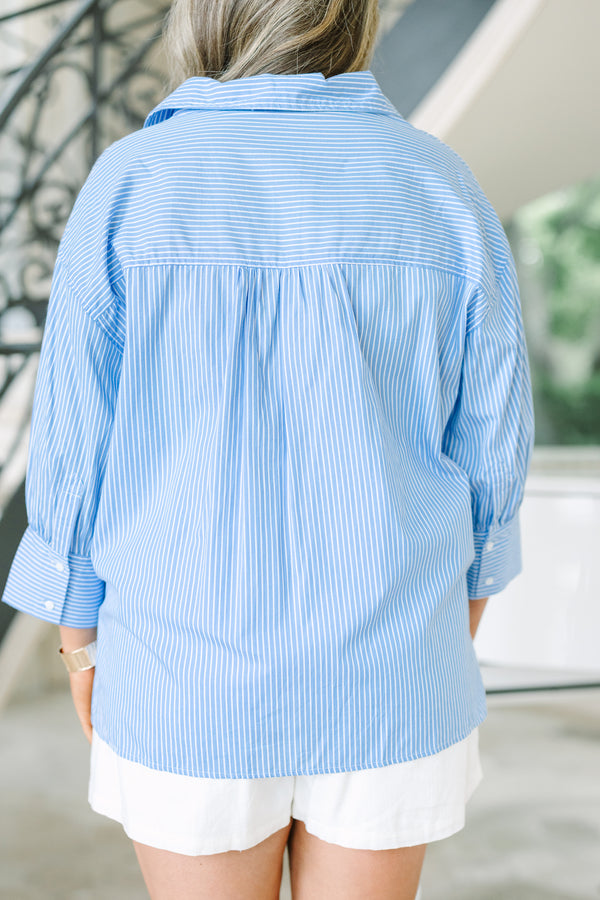 Plus Size blue and white vertical striped button-down shirt with long cuffed sleeves.