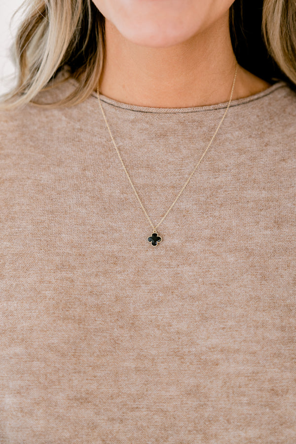 Chic Soul plus size clothing, gold necklace with a black small pendent hanging down on the center of the necklace 