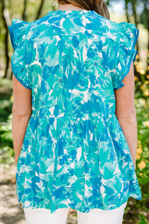 Chic Soul plus size clothing, blue casual babydoll top with a flutter sleeve and white and aqua floral pattern