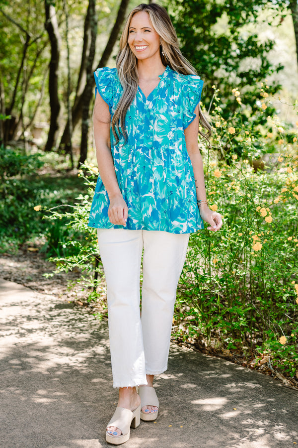 Chic Soul plus size clothing, blue casual babydoll top with a flutter sleeve and white and aqua floral pattern