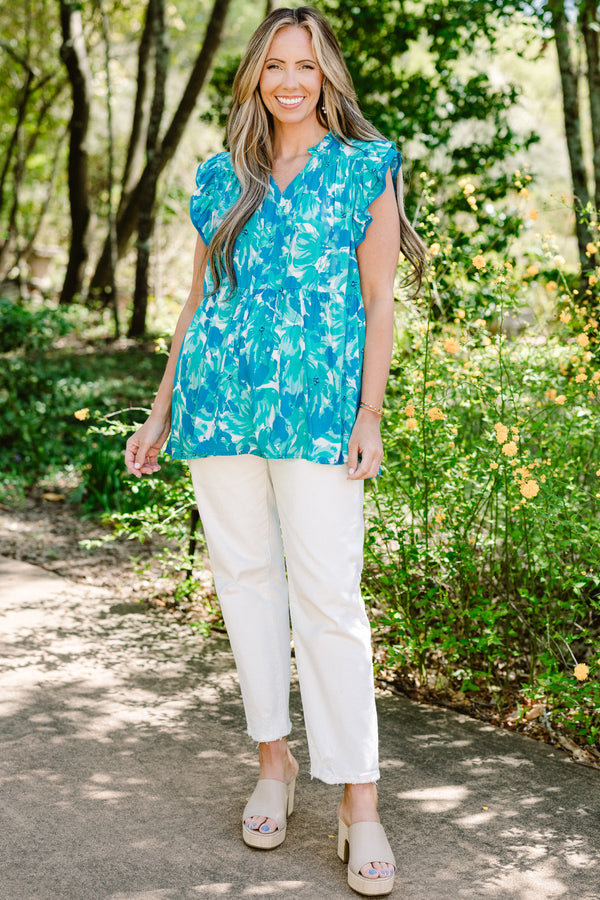Chic Soul plus size clothing, blue casual babydoll top with a flutter sleeve and white and aqua floral pattern