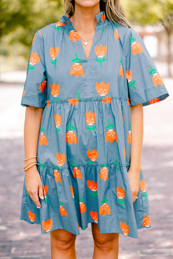 Chic Soul plus size clothing, orange baby doll dress with short sleeves and orange tulips throughout the dress