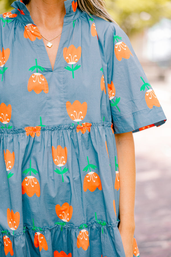 Chic Soul plus size clothing, orange baby doll dress with short sleeves and orange tulips throughout the dress