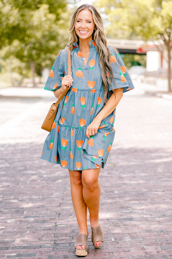 Chic Soul plus size clothing, orange baby doll dress with short sleeves and orange tulips throughout the dress