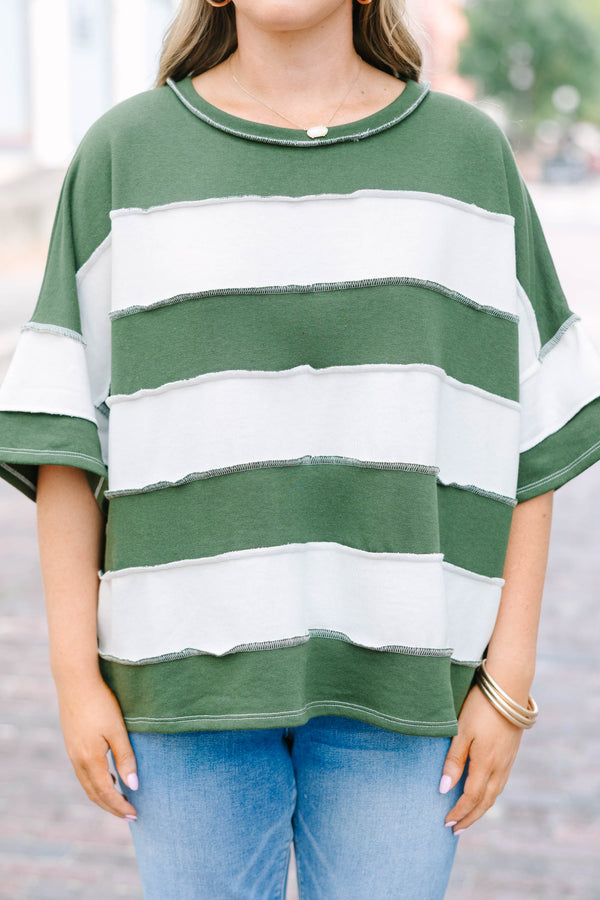 Plus Size army green and white striped French terry top with exposed seams and a relaxed fit.