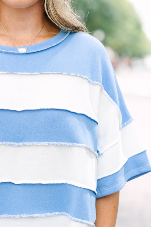 Plus Size cornflower blue and white striped French terry top with exposed seams and relaxed fit.
