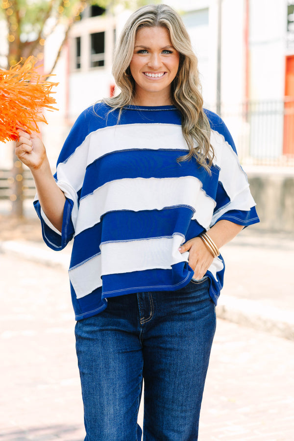 Plus Size navy and white striped French terry top with exposed seams and a relaxed fit.