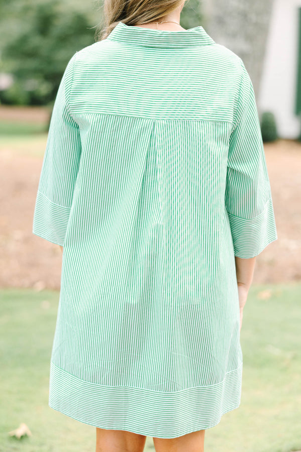 Plus size green and white striped cotton shirt dress with three-quarter sleeves and a flowy fit.