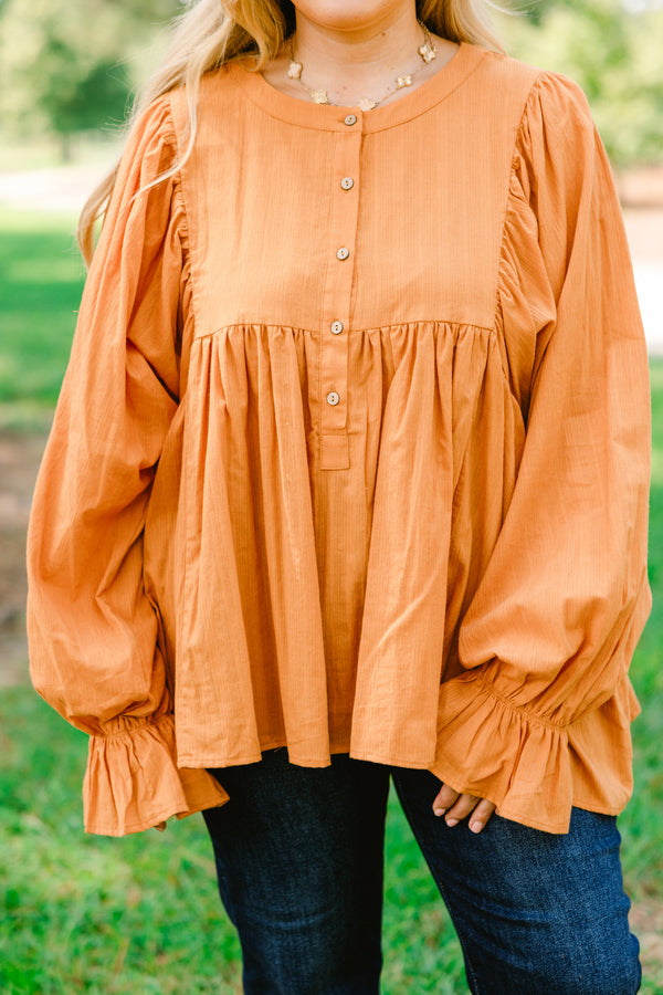 Chic Soul plus size clothing, orange long sleeve top with flutter sleeves and buttons half way down